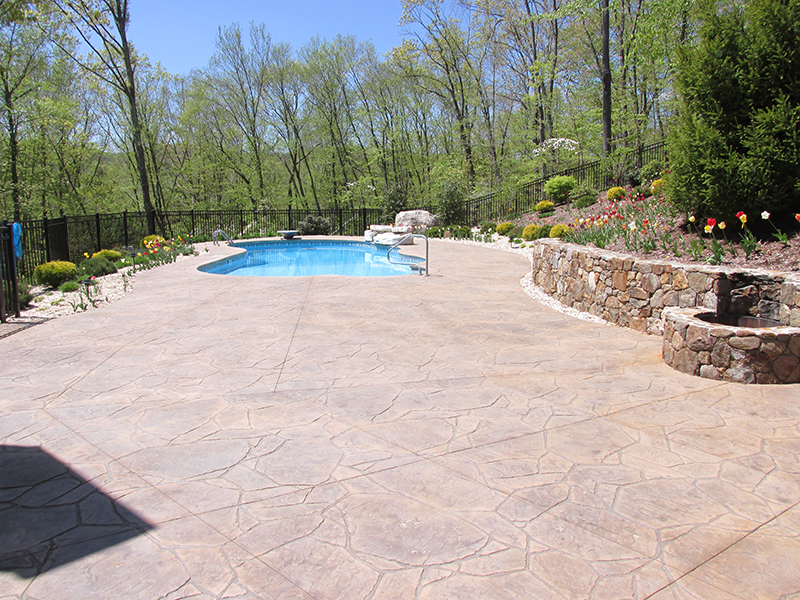 Swimming pool and stamped concrete project example 6